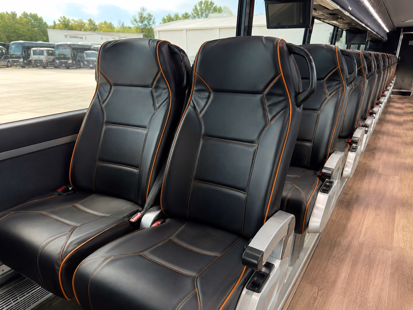 sports team fan charter bus rentals in raleigh